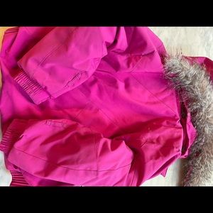 - Spyder “Lola” insulated ski jacket with detachable faux fur trim